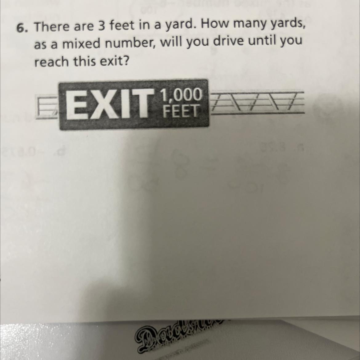 There are 3 feet in a yard. How many yards, as a mixed number, will you drive until you reach this exit?