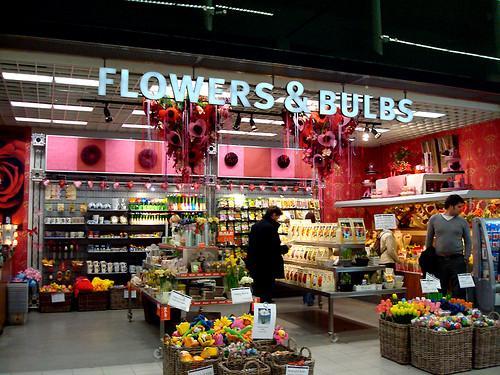 Khalid purchases flower bulbs from a catalog for 2$ each, plus a 4$ shipping charge for the entire order.