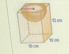 Find the volume of the box with the bowl shaped head out of the top. What is the volume of the rectangular