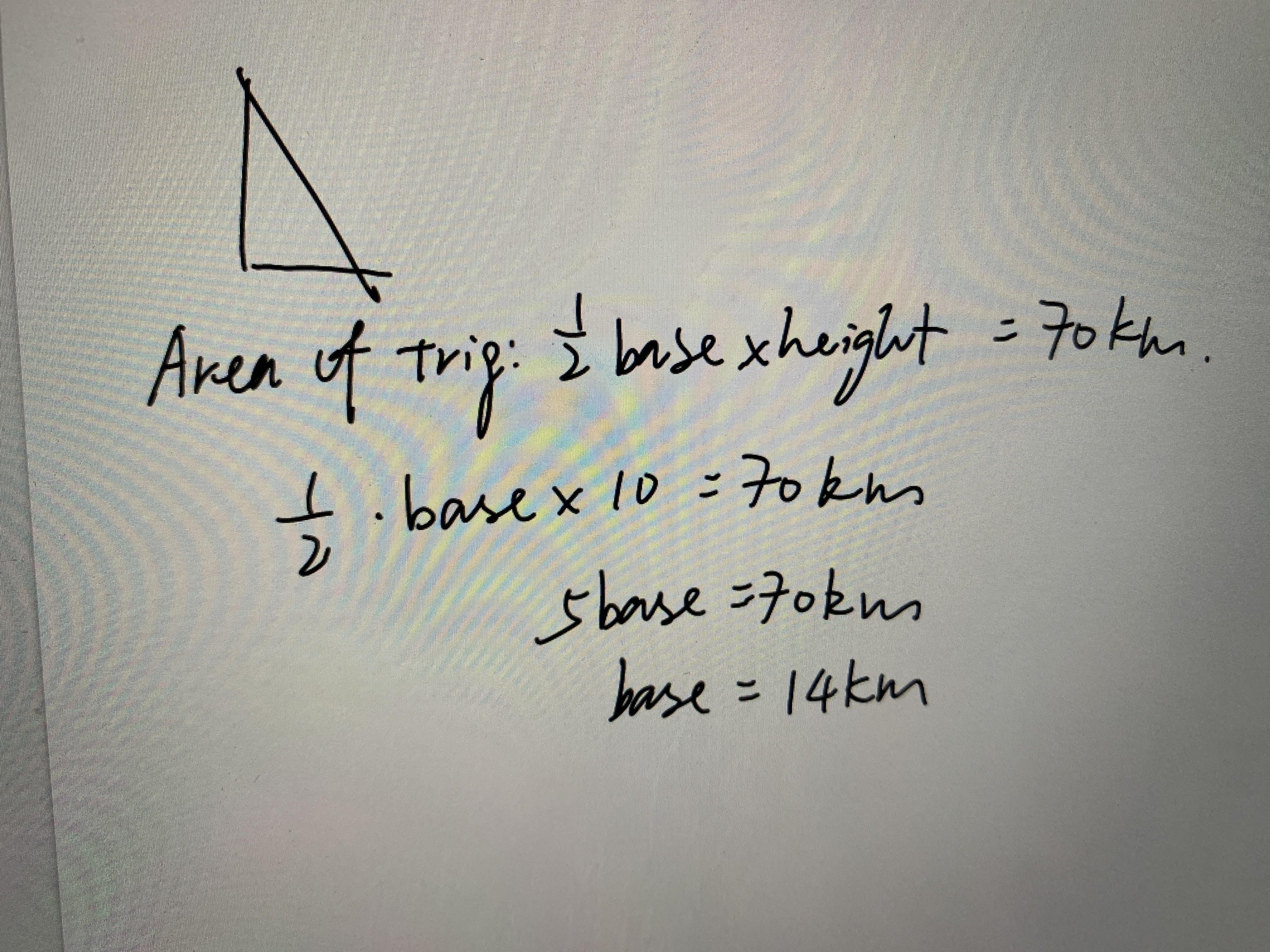 A triangle has an area of 70 square kilometers and a height of 10 kilometers.what is the length of the