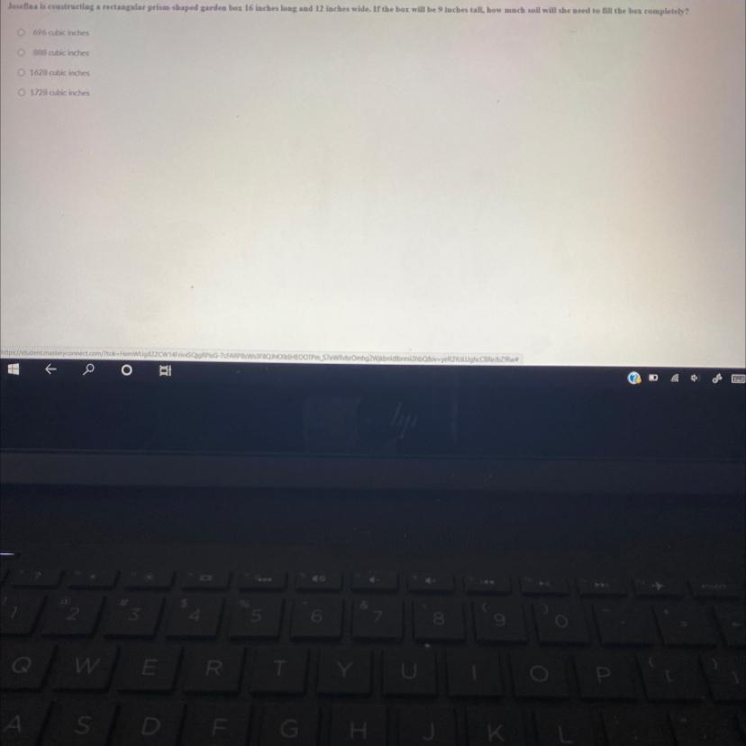 How many soil will she need to fill the box completely