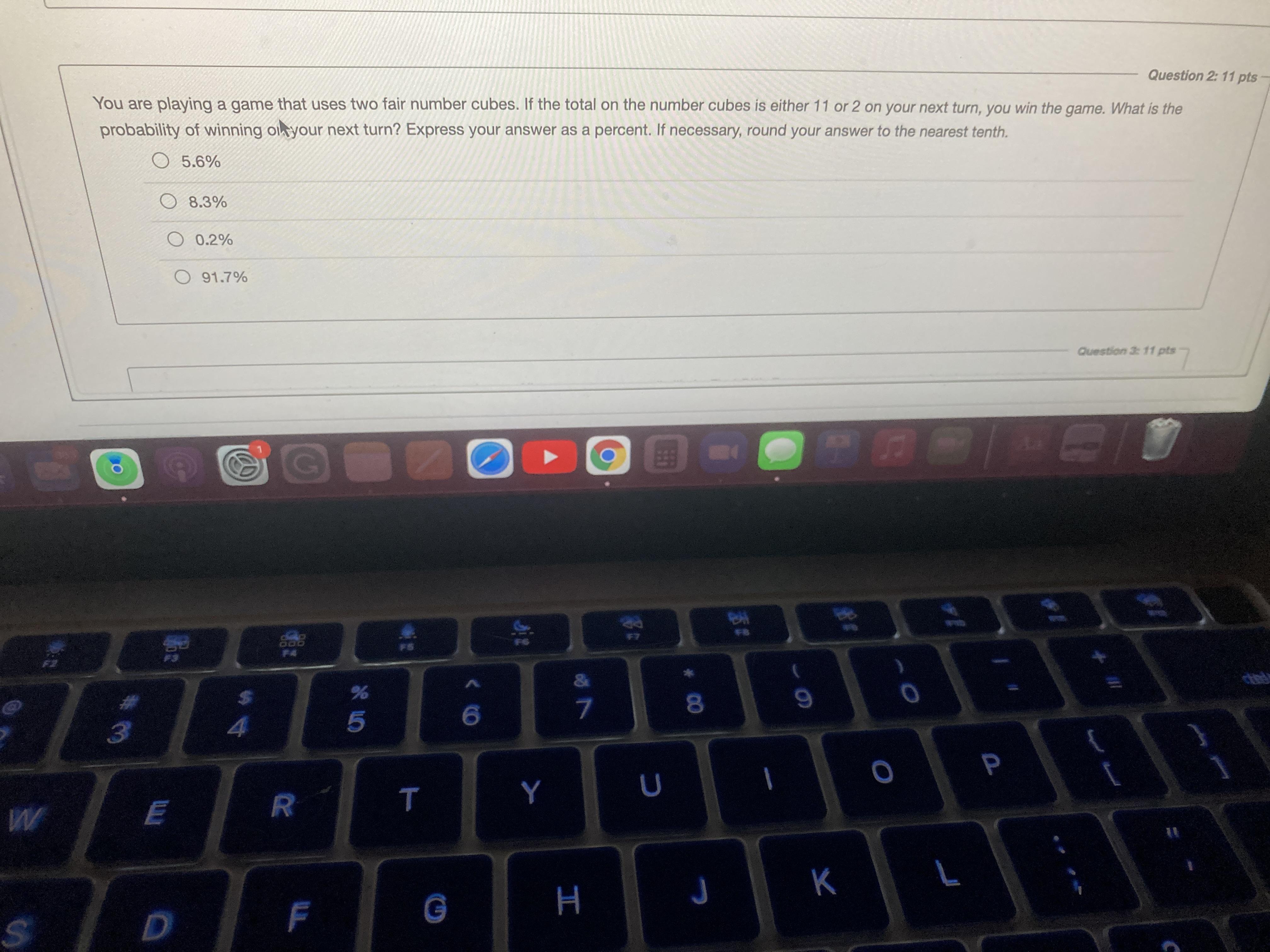 You are playing a game that uses two fair number cubes. If the total on the number cubes is either 11
