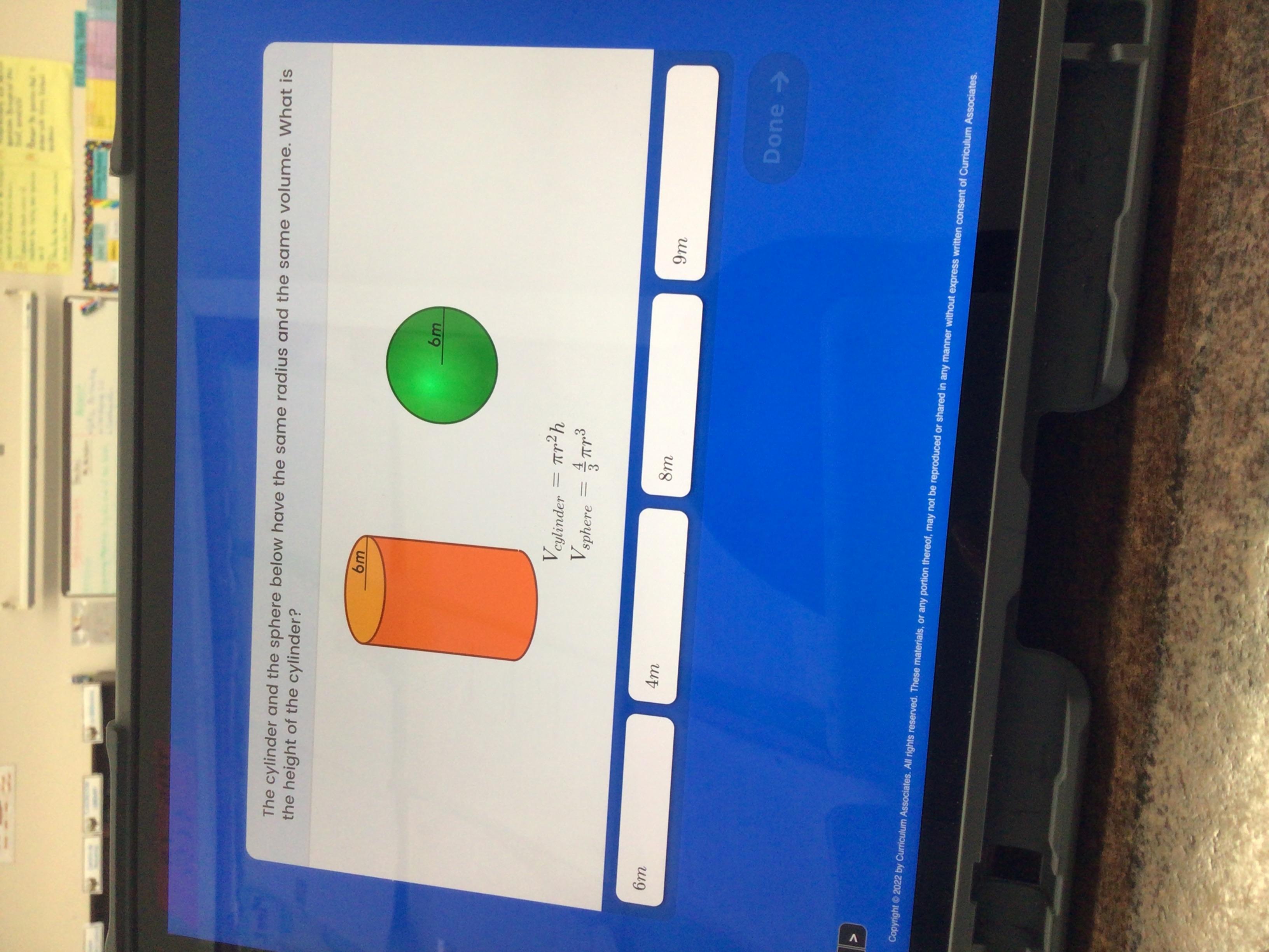 A cylinder and the Sphere below have the same radius and the same volume. What is the height of the cylinder