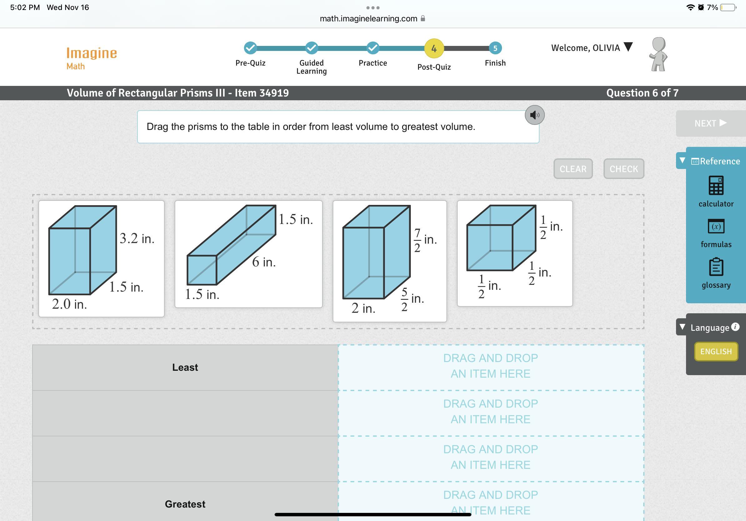 Drag the prisms to the table in order from least volume to greatest volume.