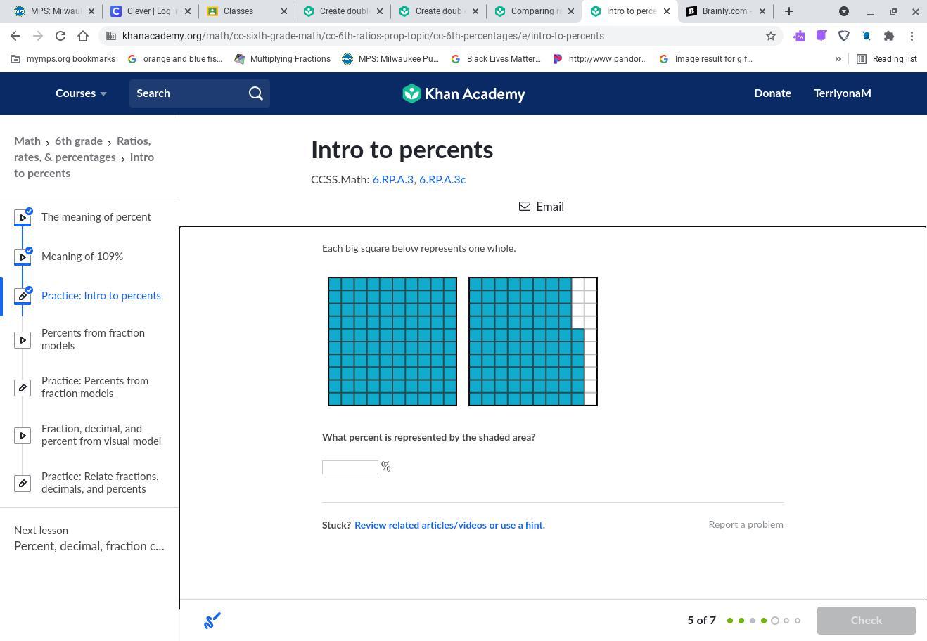 Each big square below represents one whole What percent is represented by the shaded area?