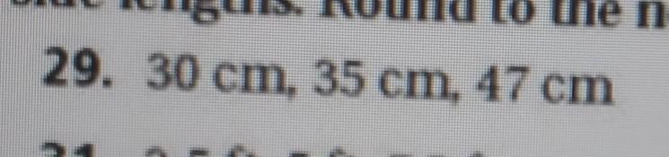 find the area of the triangle with the given side lengths. Round to the nearest tenth.