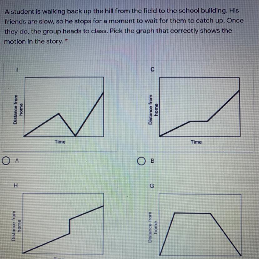 A student is walking back up the hill from the field to the school building. Hisfriends are slow, so